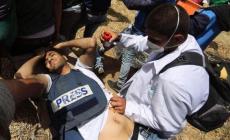 لحظة اصابة الصحفي الشهيد ياسر مرتجى