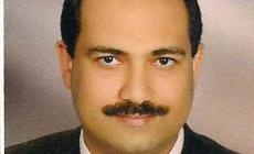 الأستاذ علي النزلي