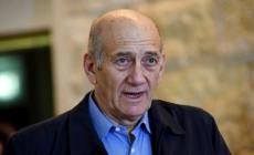 أولمرت يخشى اعتقاله في سويسرا