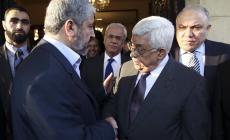 عباس يهاتف  مشعل مطمئنا على صحته