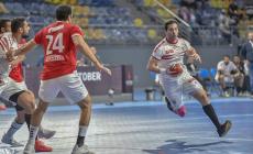 الأحمر يمينا