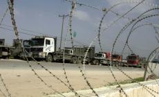 مستوطنون يغلقون الطرق أمام عبور شاحنات قرب معبر كرم أبو سالم