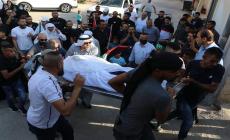 صورة لتشييع جثمان الشهيدة ابتسام الكعبابنة
