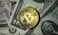 مستوى قياسي للبتكوين يقارب 10 آلاف دولار