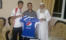 محمد القاضي بجانب عبد السلام هنية