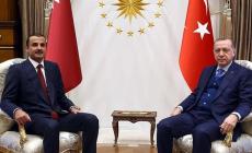 أردوغان يمينا وبجانبه تميم