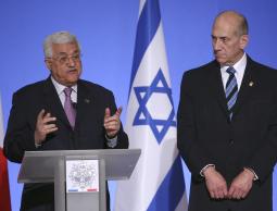 شروط أولمرت لعباس في أول لقاء جمعهما 2007