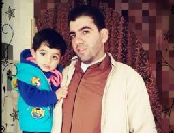 صورة للطفل ووالده