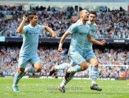 فرحة لاعبي السيتي بالتتويج بلقب الدوري