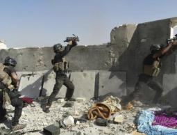  عناصر القوات الخاصة العراقية أثناء عمليات سابقة قرب الرمادي