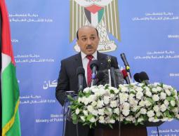 خلال مؤتمر وزير الأشغال العامة والإسكان في حكومة التوافق مفيد الحساينة