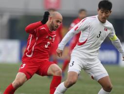 جانب من مباراة سابقة للأولمبي