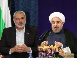  الرئيس الإيراني حسن روحاني ونائب رئيس المكتب السياسي لحماس إسماعيل هنية