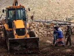 الاحتلال يجرف أراضي (أرشيف)