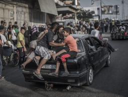 هروب المواطنين من الشجاعية خلال الحرب الاخيرة (الأرشيف)