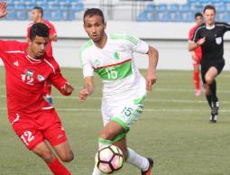 جانب من مباراة الأولمبي الفلسطيني ونظيره الجزائري