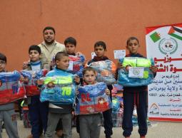 توزيع كسوة الشتاء