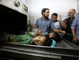 أحد الاطفال الذين استشهدوا في المجزرة