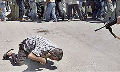 اعدام احد العملاء المتورطين مع الاحتلال الاسرائيلي