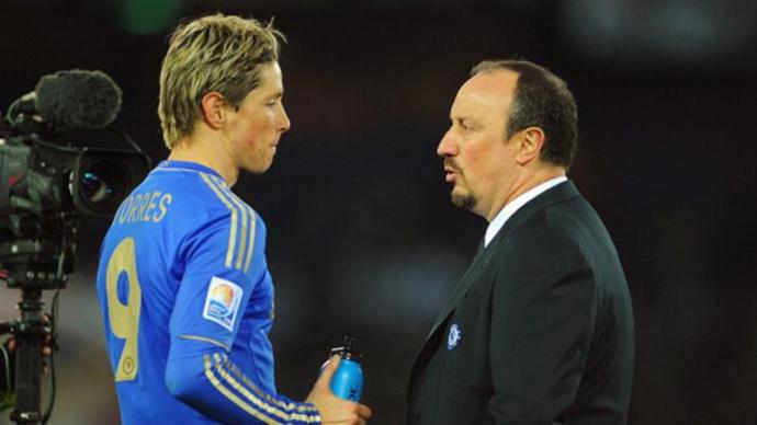 توريس بجانب مدربه بينيتز