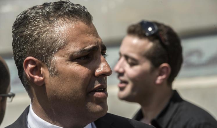 باهر محمد (يمين) ومحمد فهمي يحاكمان مع بيتر غريستي بتهم تشمل "الإرهاب" و"تهديد الأمن القومي