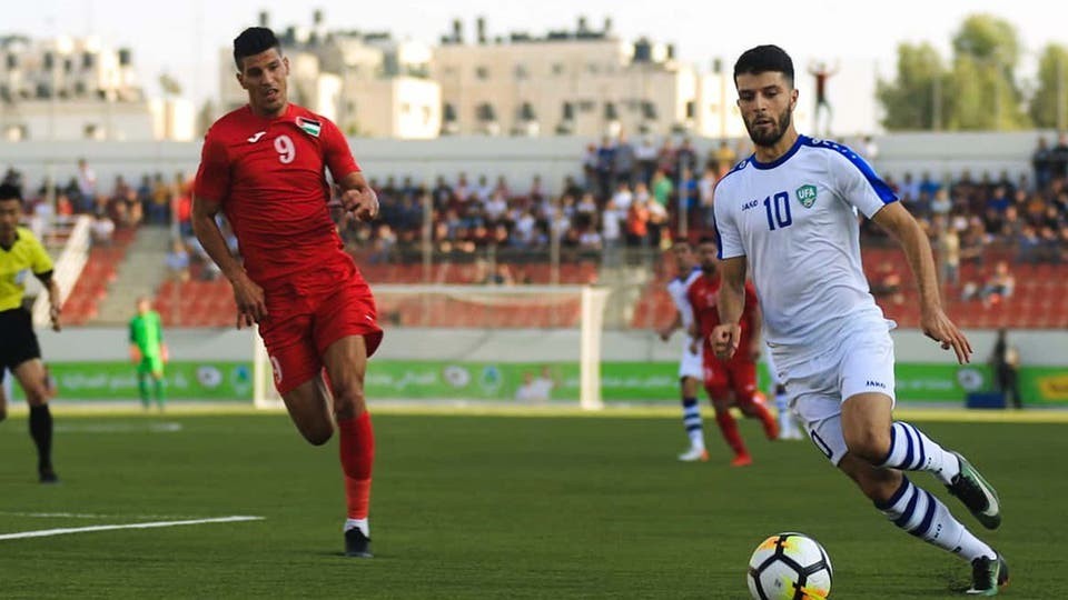جانب من مباراة الوطني وأوزبكستان
