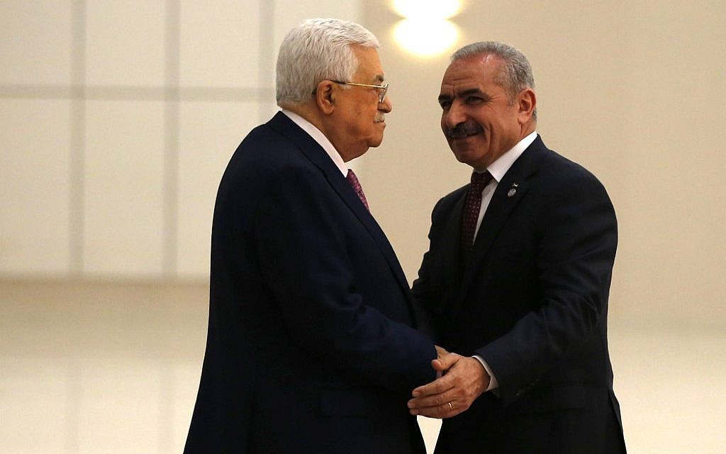 اشتية وعباس