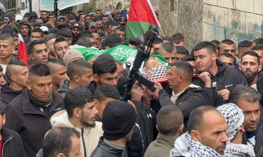 صورة من جنازة الشهداء