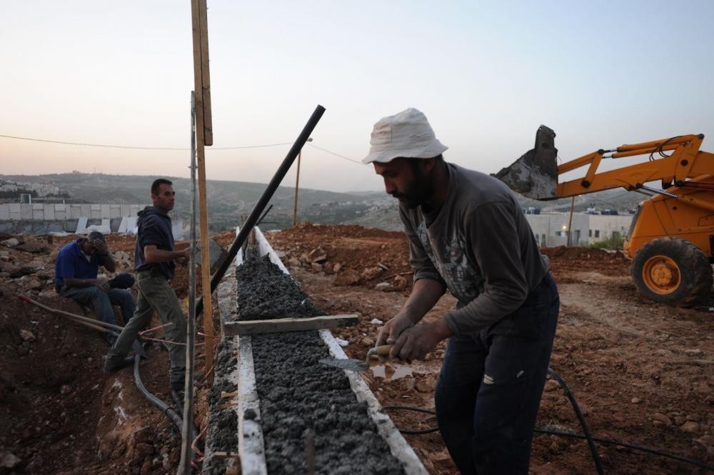 صورة عامل فلسطيني