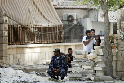 اشتباكات بحماة وقصف على حلب 