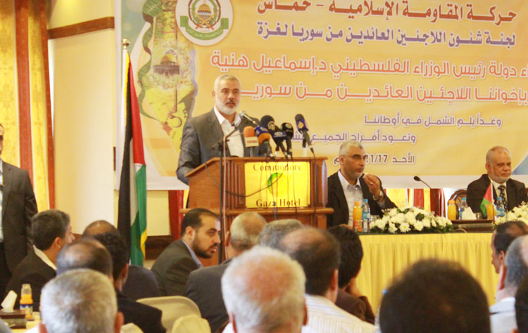 رئيس الوزراء إسماعيل هنية خلال المؤتمر(تصوير محمود أبو حصيرة)