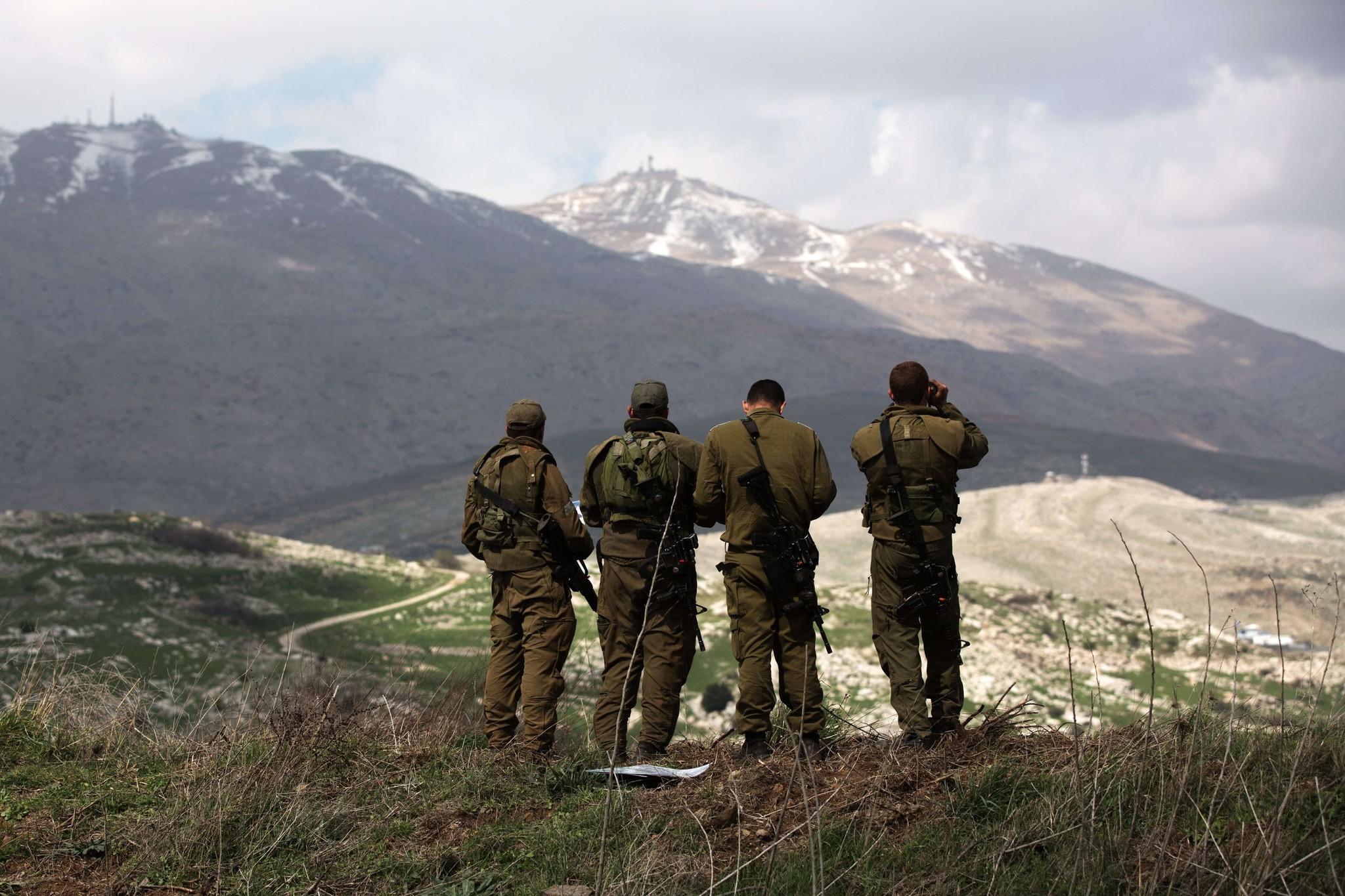 la-fg-wn-israel-syria-hezbollah-20140319-001