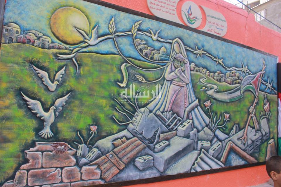 الجدارية الفنية التشكيلية (سيدة الأرض)