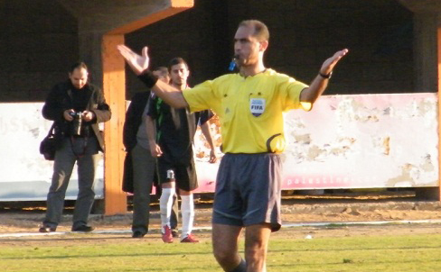 الحكم أشرف زملط