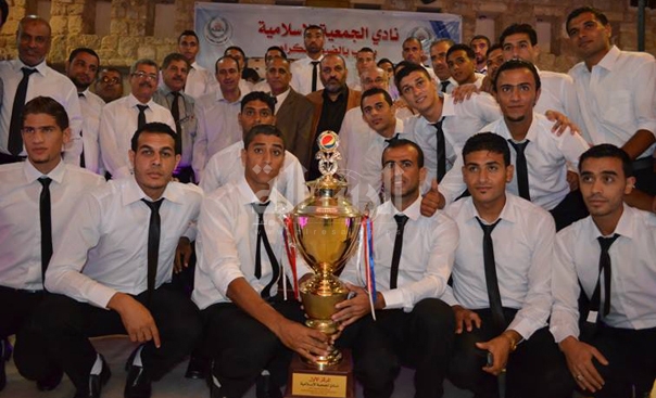 فريق الجمعية برفقة المدهون وأبو حشيش خلال الحفل